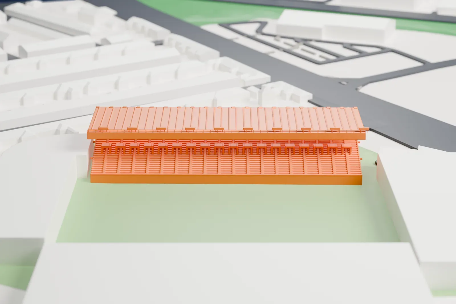 A white 3D print of Hillsborough's North Stand, a long raked terrace under a flat cantilevered roof with lamp banks on the fascia, among the surrounding streets and buildings.