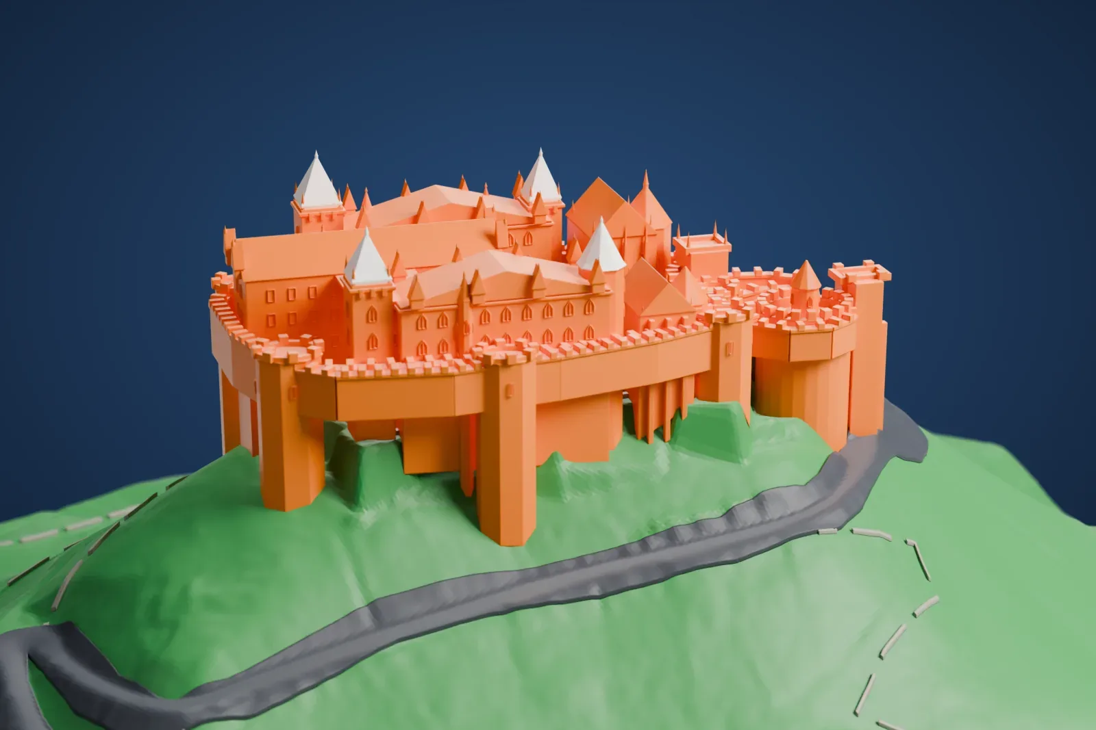 A white 3D print of Hohenzollern Castle, a cluster of pointed towers and battlemented walls on a green hilltop, with a winding road around its base.