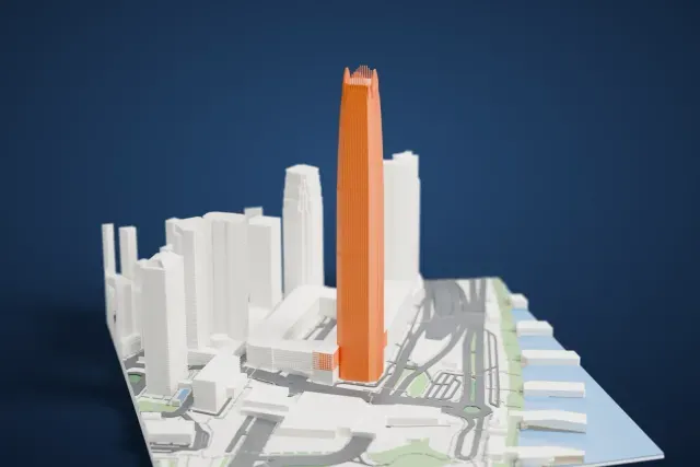 A white 3D print of the Hong Kong IFC model in Hong Kong, with the streets around it.