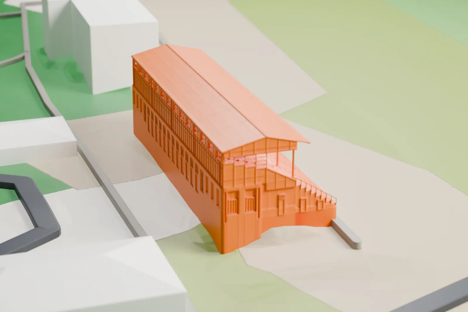 A white 3D print of Tribune III at the Hoppegarten racecourse, a long grandstand with a shallow gabled roof and open terraces facing the track, beside other racecourse buildings.