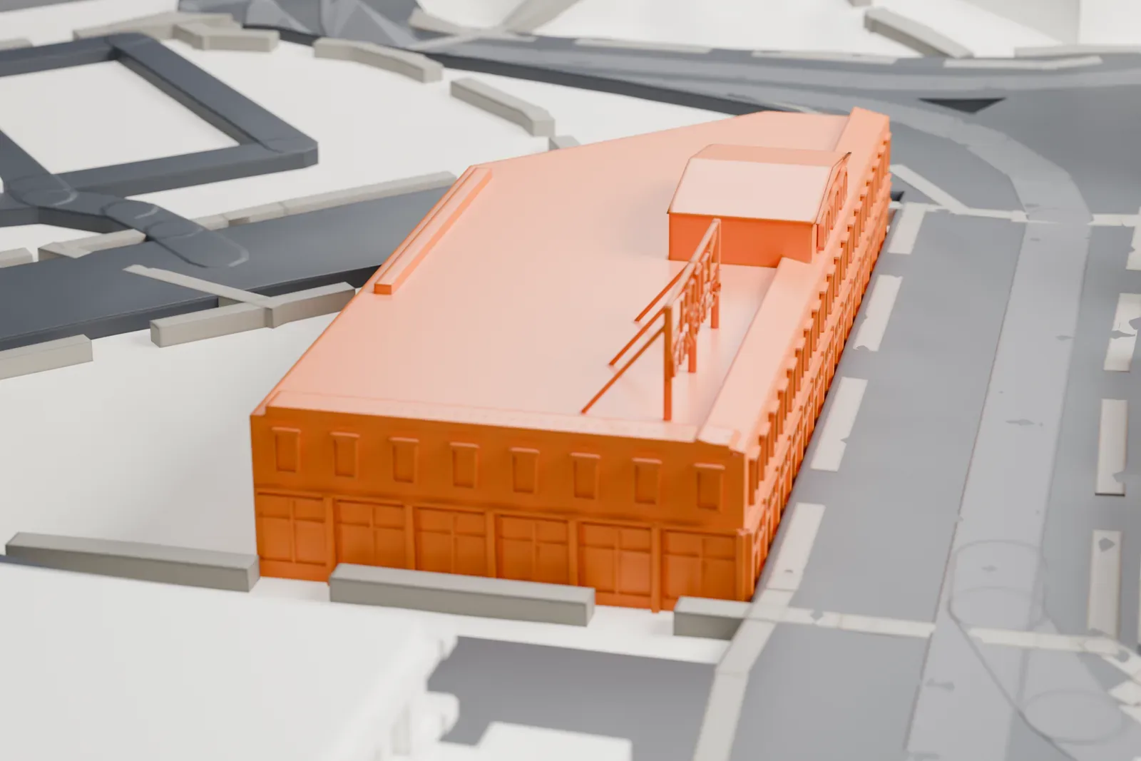 A white 3D print of Hotel Congress, a low corner building with a rooftop sign and a small rooftop structure, standing among wide streets and nearby buildings.