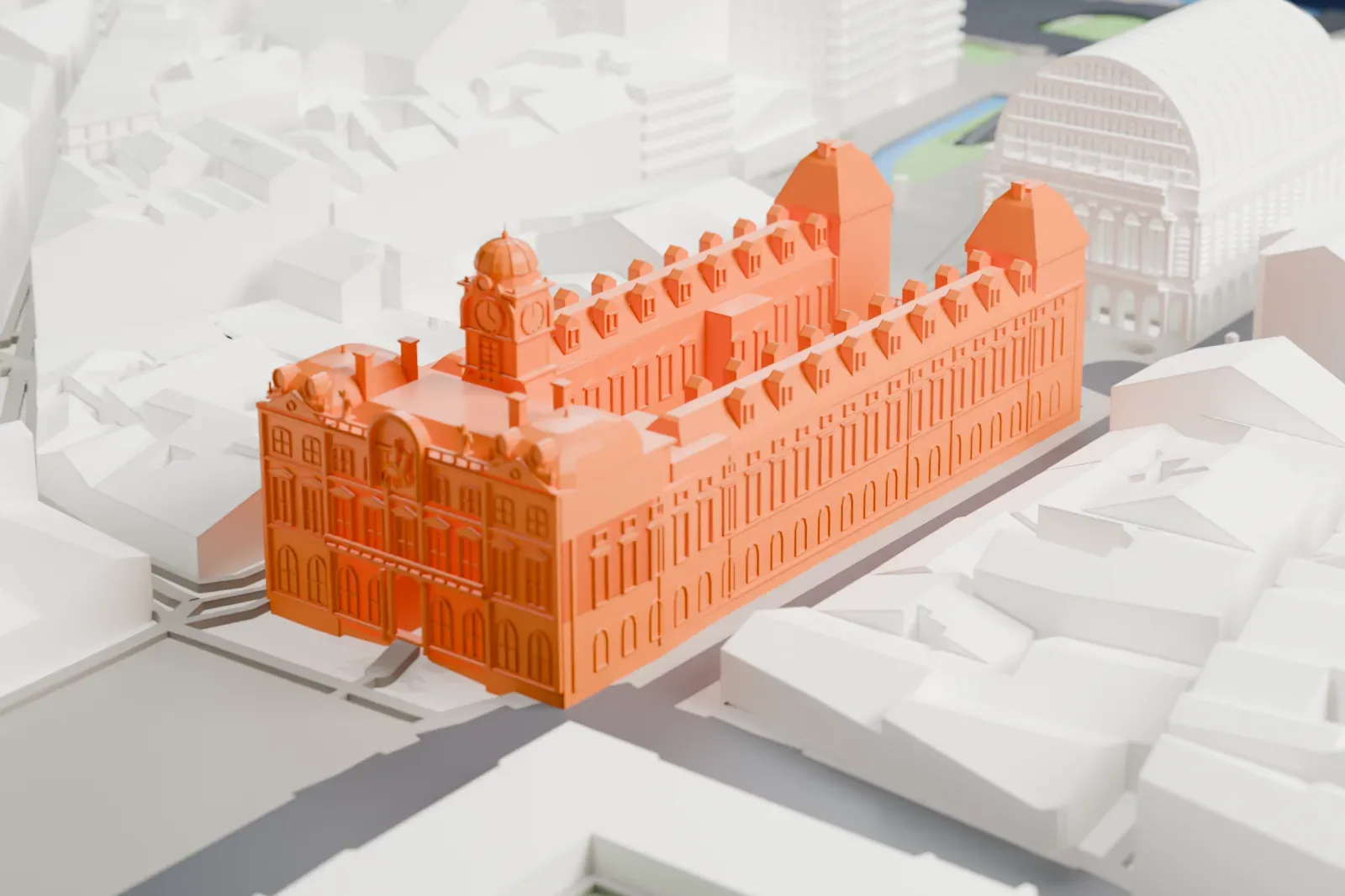A white 3D print of the Hôtel de Ville in Lyon, its clock tower and pavilion roofs rising above the surrounding city.