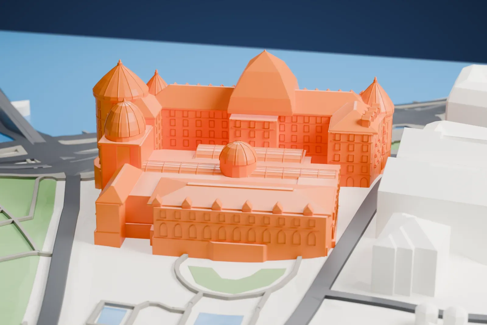 A white 3D print of the Hotel Gellért, a long Art Nouveau hotel with cone-capped corner towers, on the bank of the Danube in Budapest.