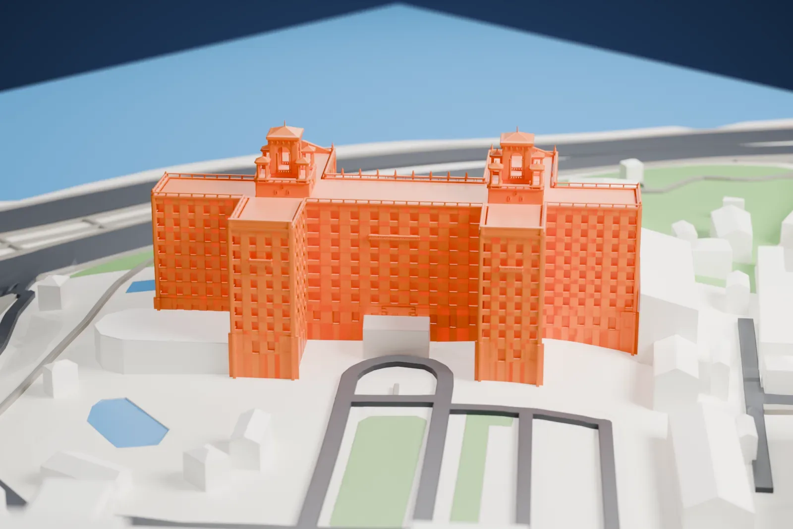 A white 3D print of the Hotel Nacional de Cuba, showing its double-cross wings, twin lantern towers and the city blocks around it.