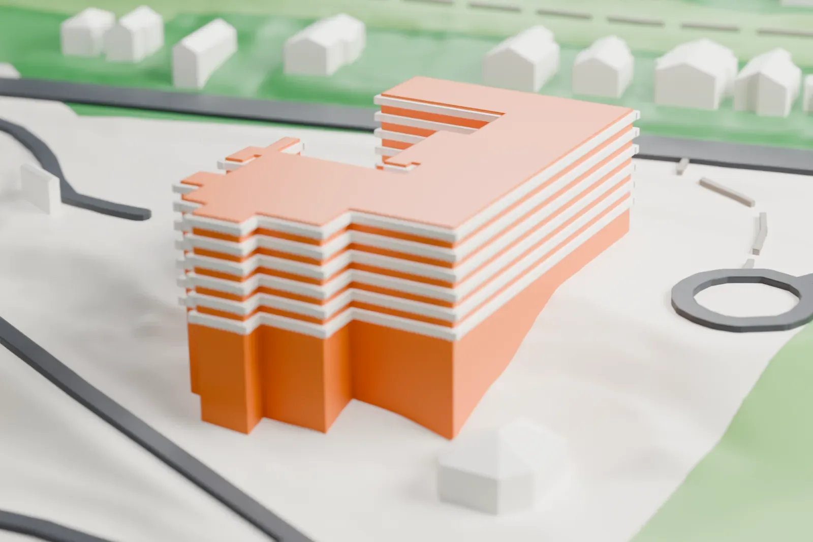 A white 3D print of the Hudson River Museum, a low, U-shaped complex with a round planetarium dome and angled skylights, on open ground near a road with houses and slopes around it.