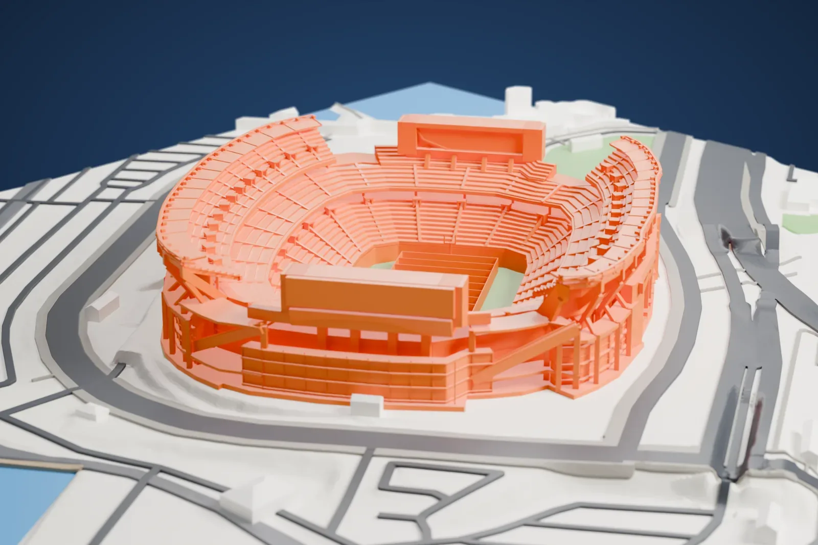 A white 3D print of Huntington Bank Field, showing its tall sideline stands and lower end stands around an open field.