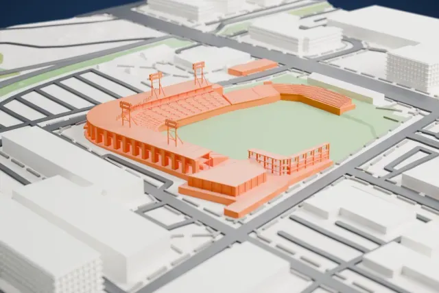 A white 3D print of Huntington Park, a baseball stadium with a curving grandstand around a green field, among city blocks and roads.
