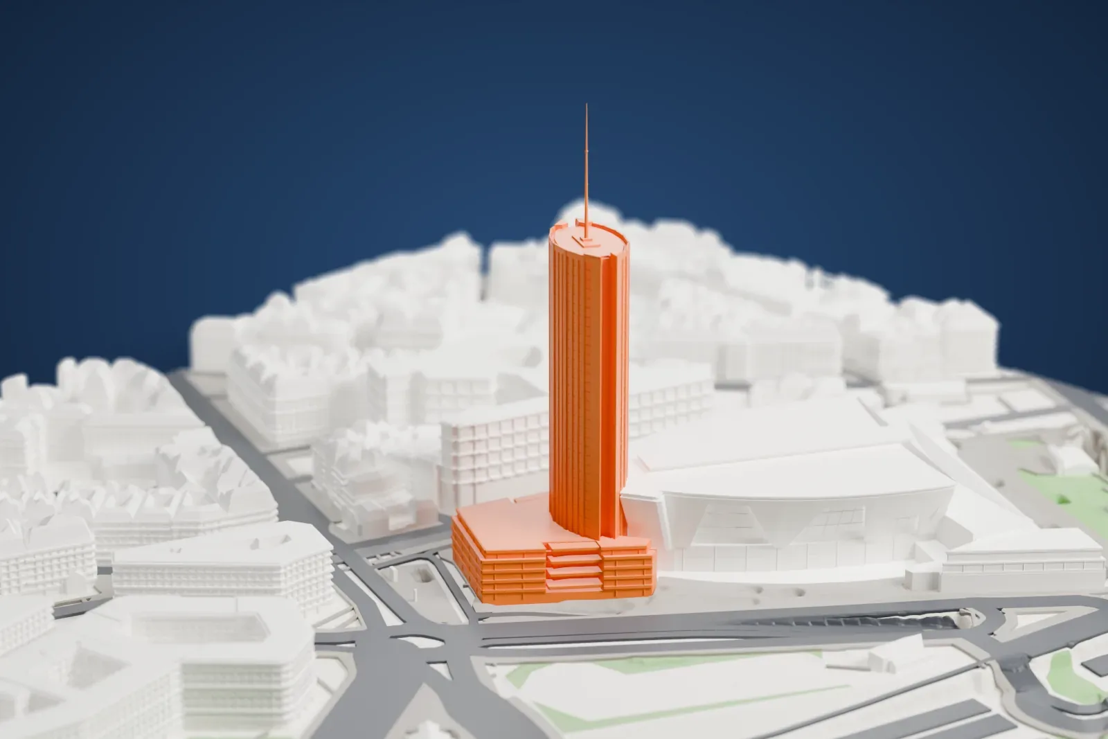 A white 3D print of the Hyatt Regency Paris Étoile with the surrounding streets and buildings of Paris.