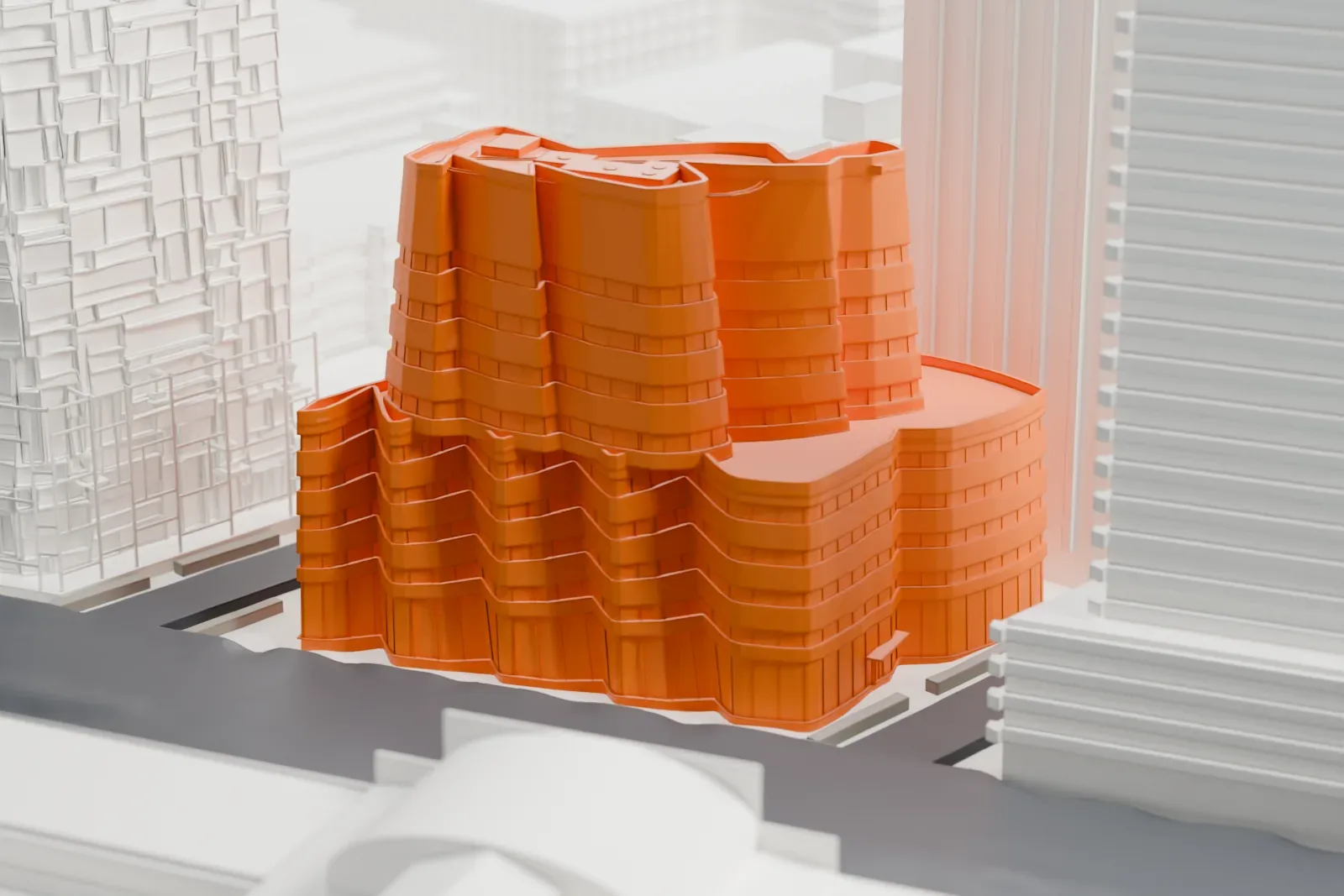 A white 3D print of the IAC Building, a curving, sail-like building of twisted sections, beside a wide street and surrounded by mid-rise buildings.