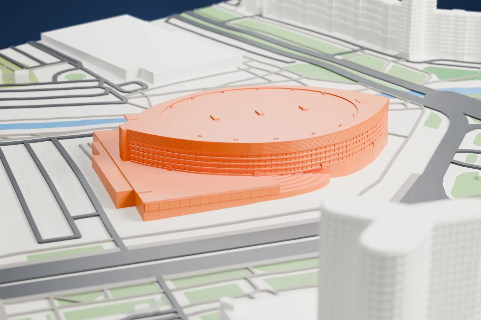 A white 3D print of the Ice Palace arena in Saint Petersburg, with the surrounding streets and buildings around it.