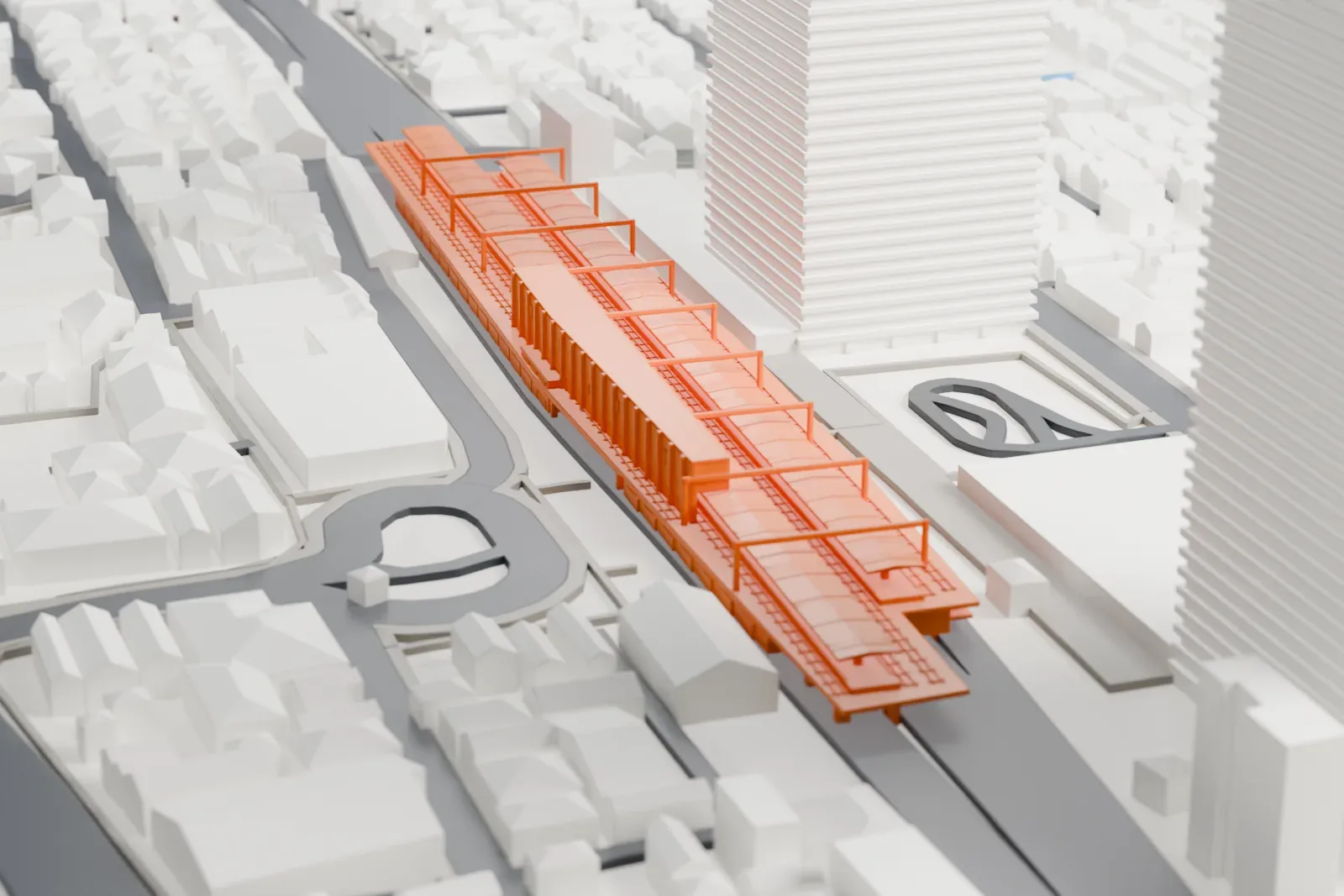 A white 3D print of Ichikawa Station, a railway station among the surrounding streets and buildings.