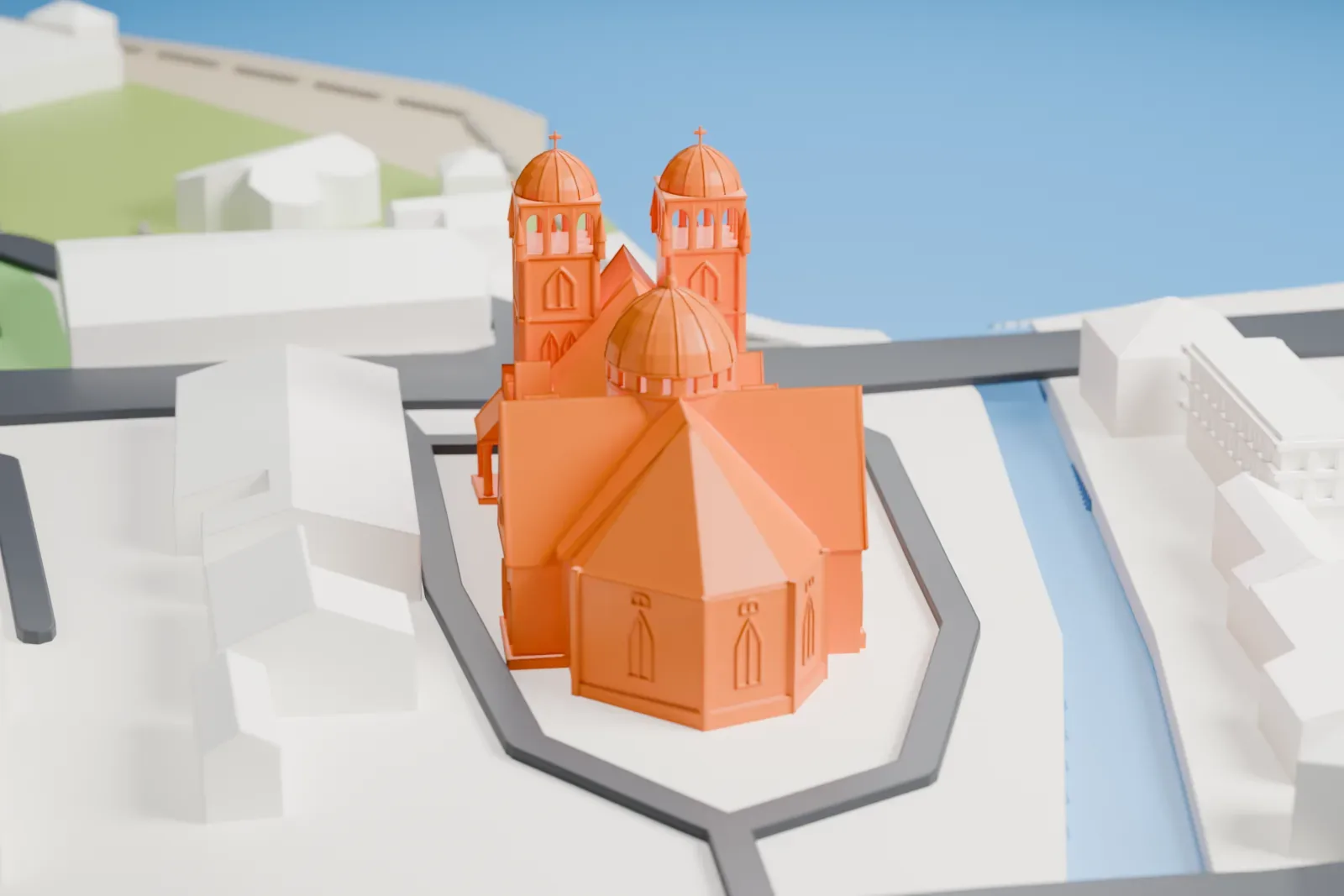 A white 3D print of the Immaculate Conception Cathedral, Apia, with twin domed towers, a larger roof dome, and rows of side columns, surrounded by streets, buildings, and water.