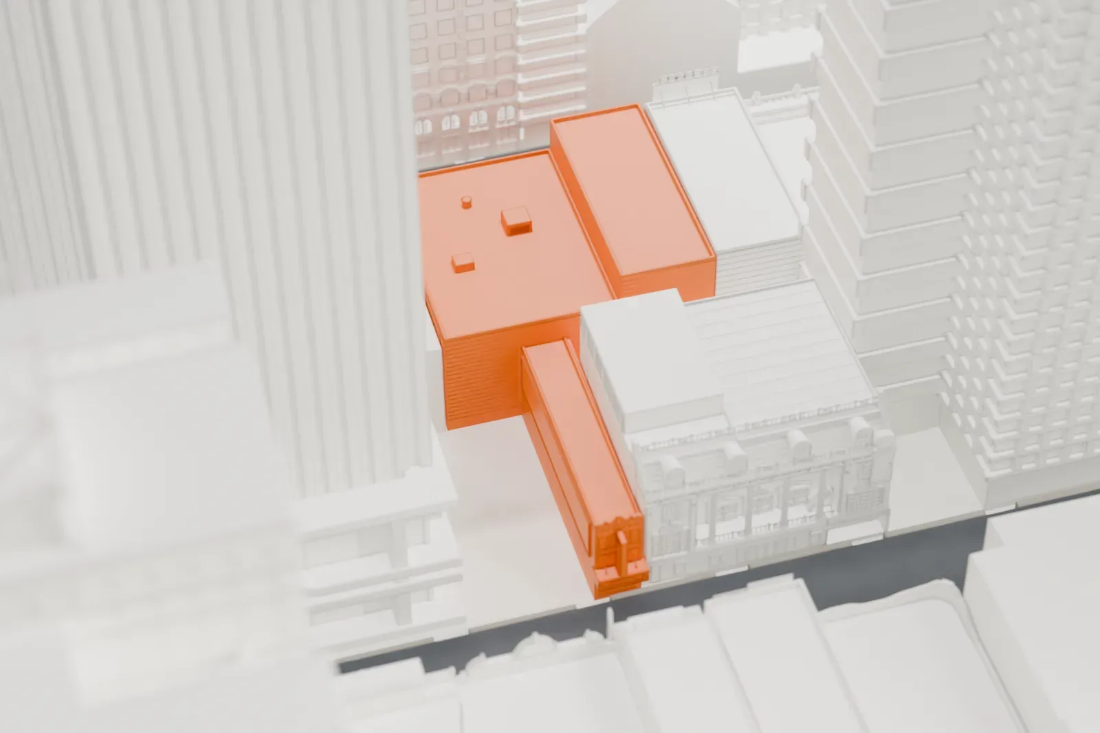 A white 3D print of the Imperial Theatre, a small low building almost hidden among very tall towers in Midtown.