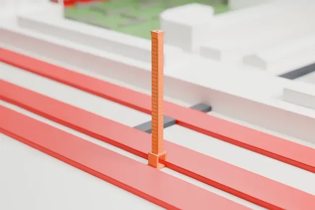 A white 3D print of the Indianapolis Motor Speedway Scoring Pylon model in Indianapolis, with the streets around it.