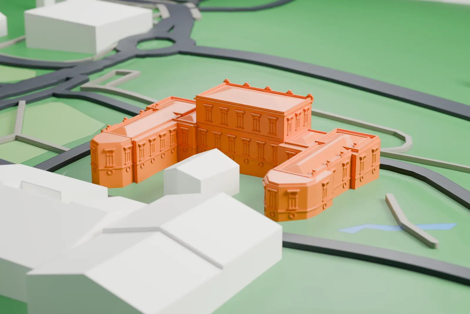 A white 3D print of the Instituto Butantan among the surrounding streets and buildings of Butantã, São Paulo.