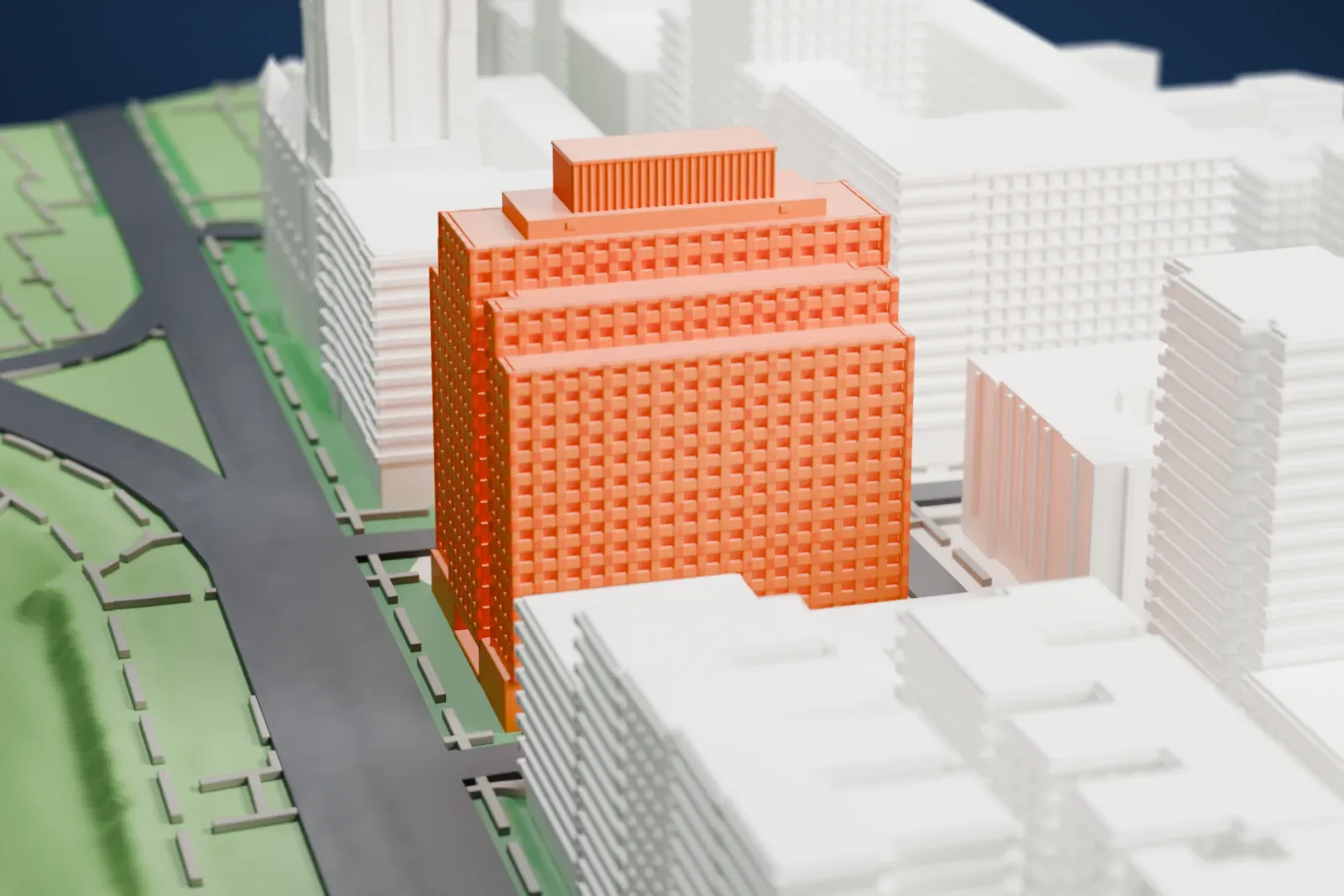 A white 3D print of the Interchurch Center, a stepped tall block beside park greenery with other buildings around it.