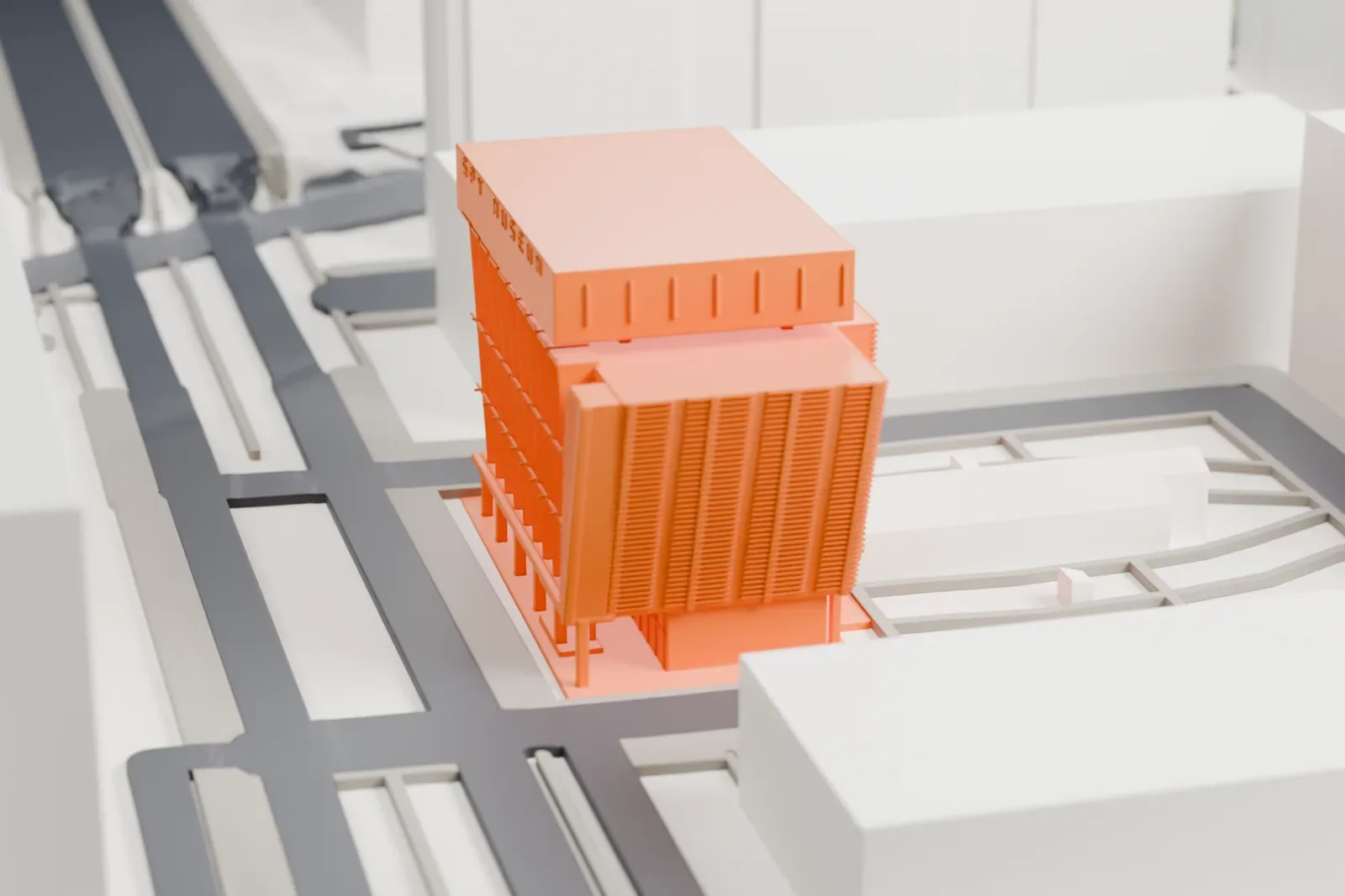 A white 3D print of the International Spy Museum, a modern building at L'Enfant Plaza, among the surrounding streets and buildings of Washington, D.C.