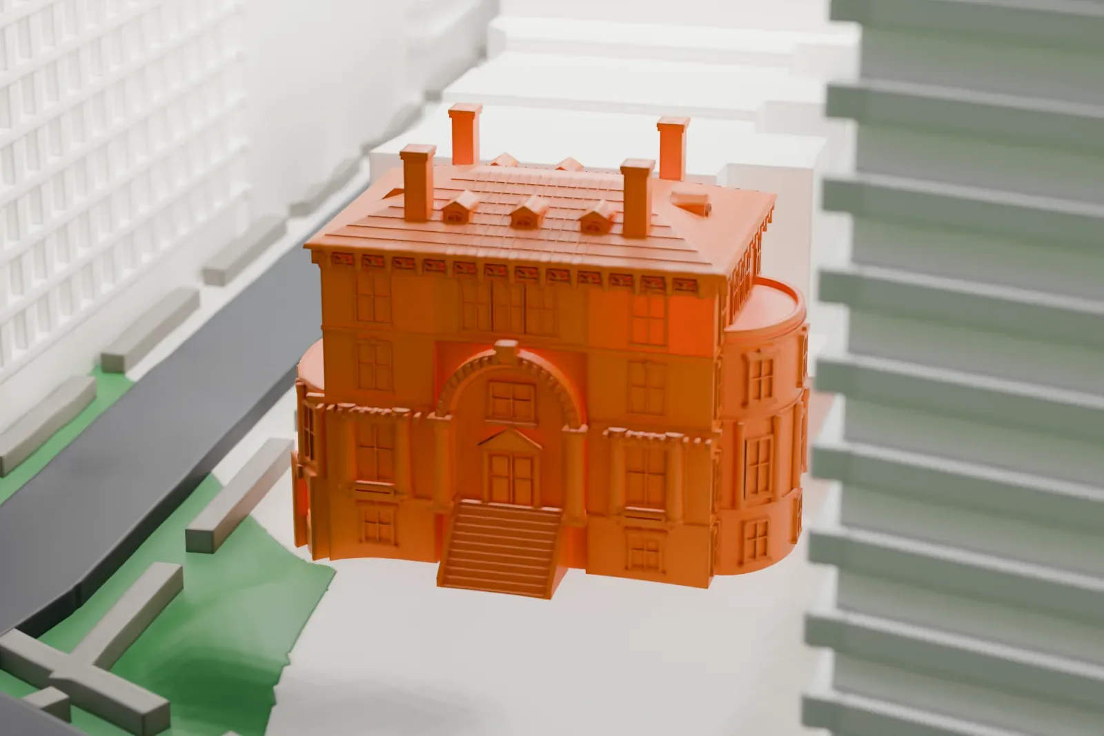 A white 3D print of the Isaac L. Rice Mansion, a small house with a hip roof at the edge of a park, with taller buildings rising behind it.