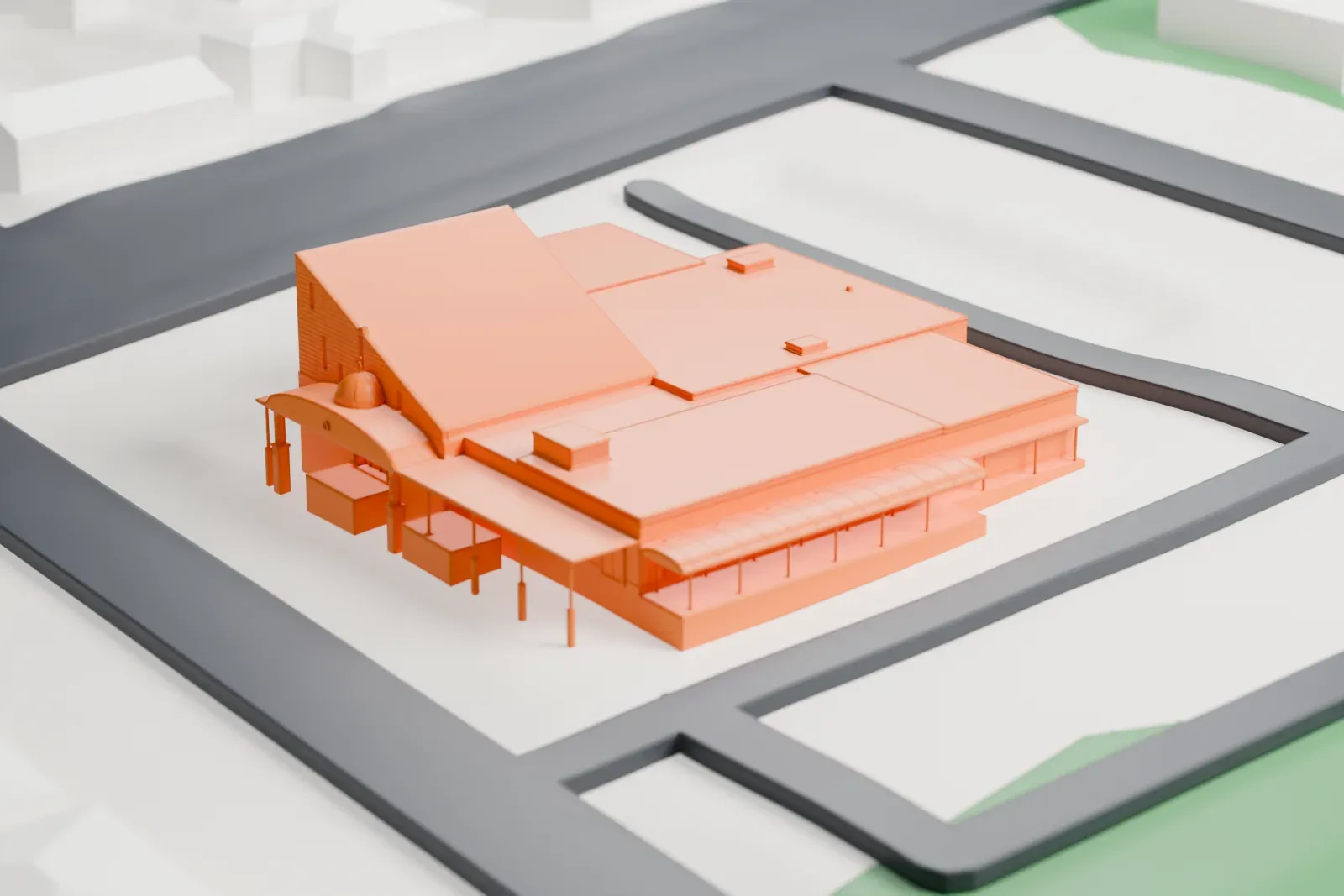 A white 3D print of the Islamic Center of Passaic County, a low, wide building with a small dome and a tall sloped roof, among streets and houses.