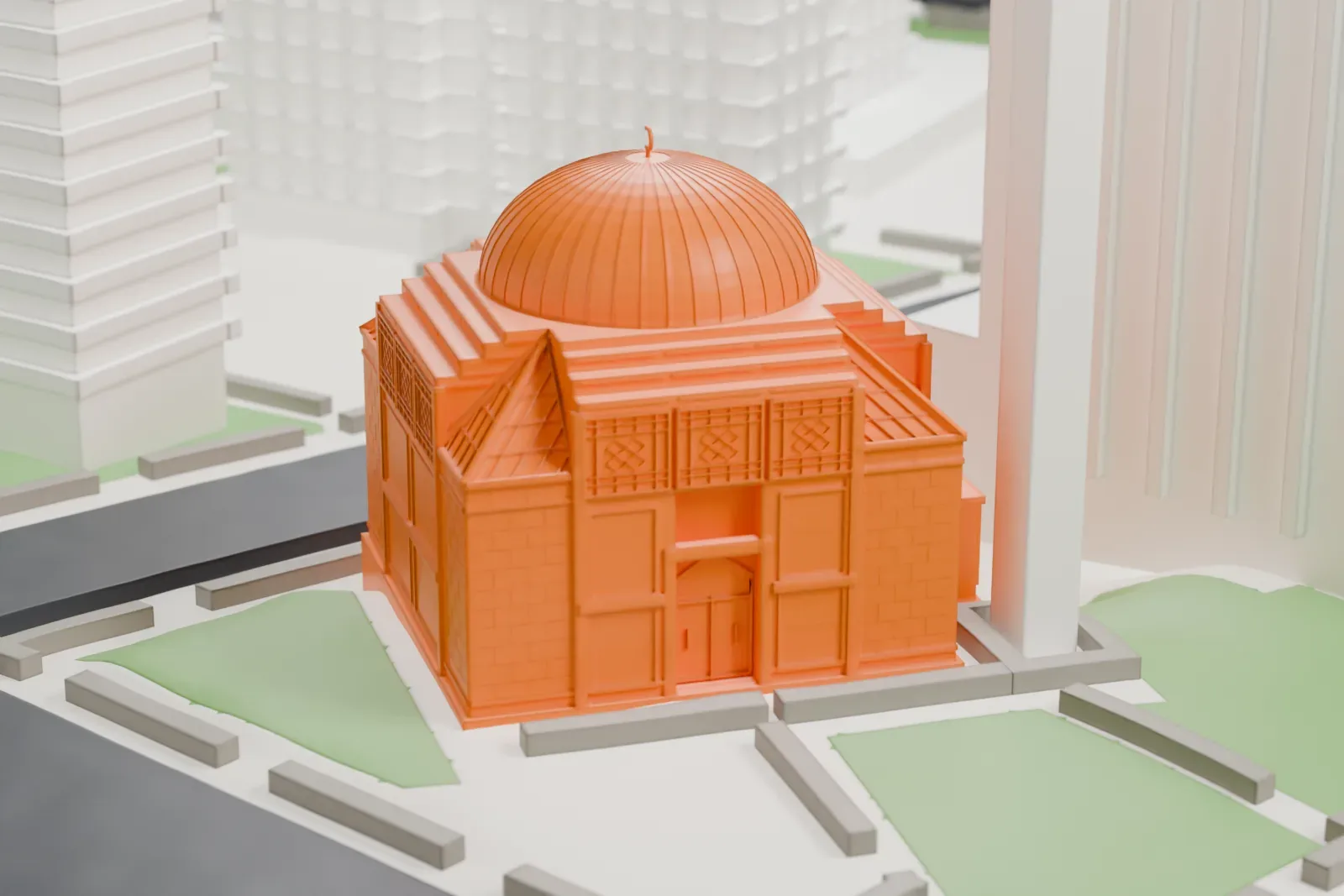A white 3D print of the Islamic Cultural Center of New York, a stone building with a large dome, set between tall buildings with small green areas and streets around it.