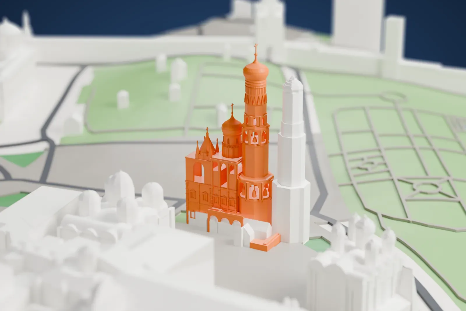 A white 3D print of the Ivan the Great Bell Tower rising among the buildings around Cathedral Square in the Moscow Kremlin.