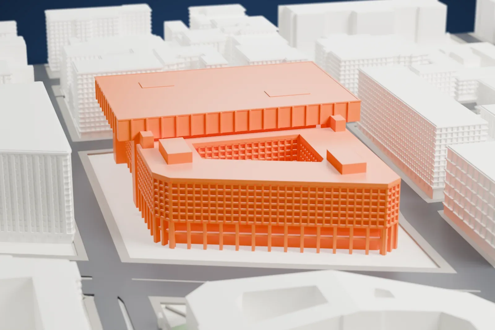 A white 3D print of the J. Edgar Hoover Building in Washington, D.C., shown among the surrounding streets and buildings.