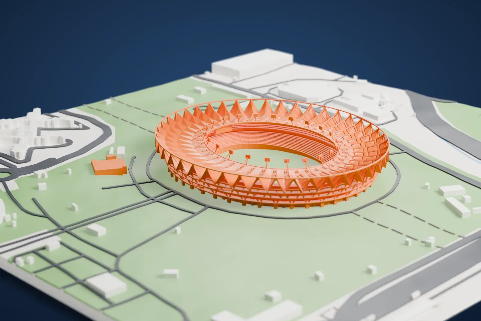 A white 3D print of Jawaharlal Nehru Stadium, an oval stadium ringed by pointed roof panels around an open green pitch, set among green grounds and roads.