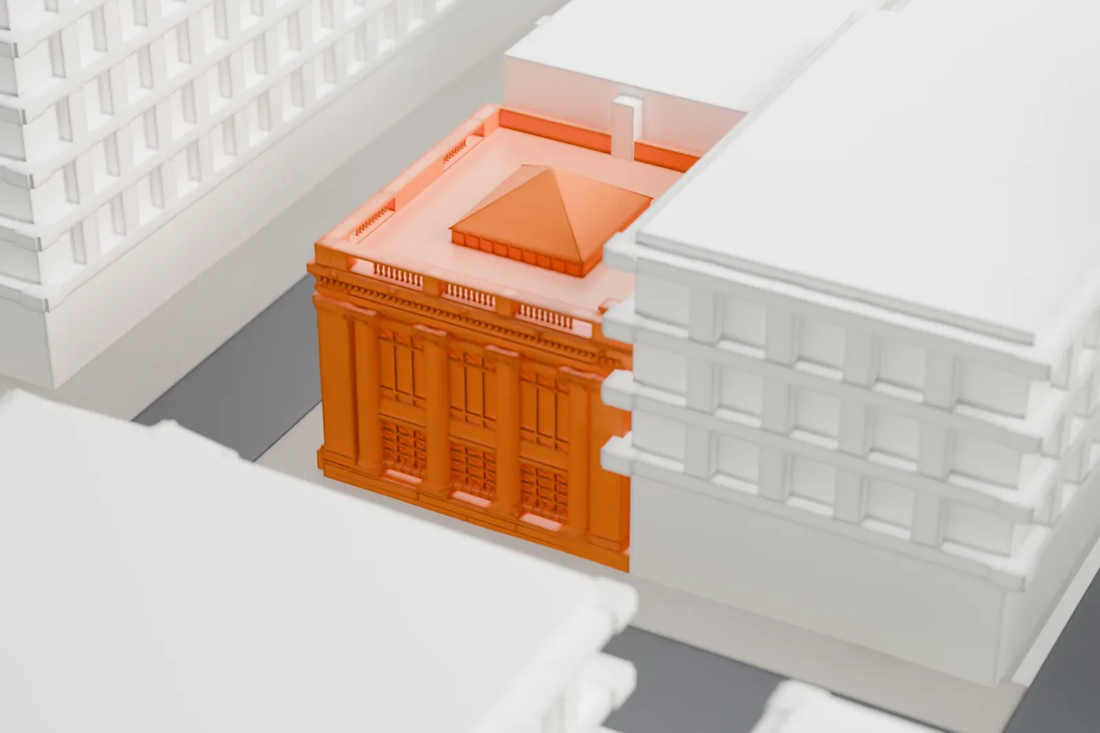 A white 3D print of the Jefferson Trust Company building, a corner building with tall columns and a pyramid-topped roof section, squeezed between taller blocks of buildings along narrow streets.
