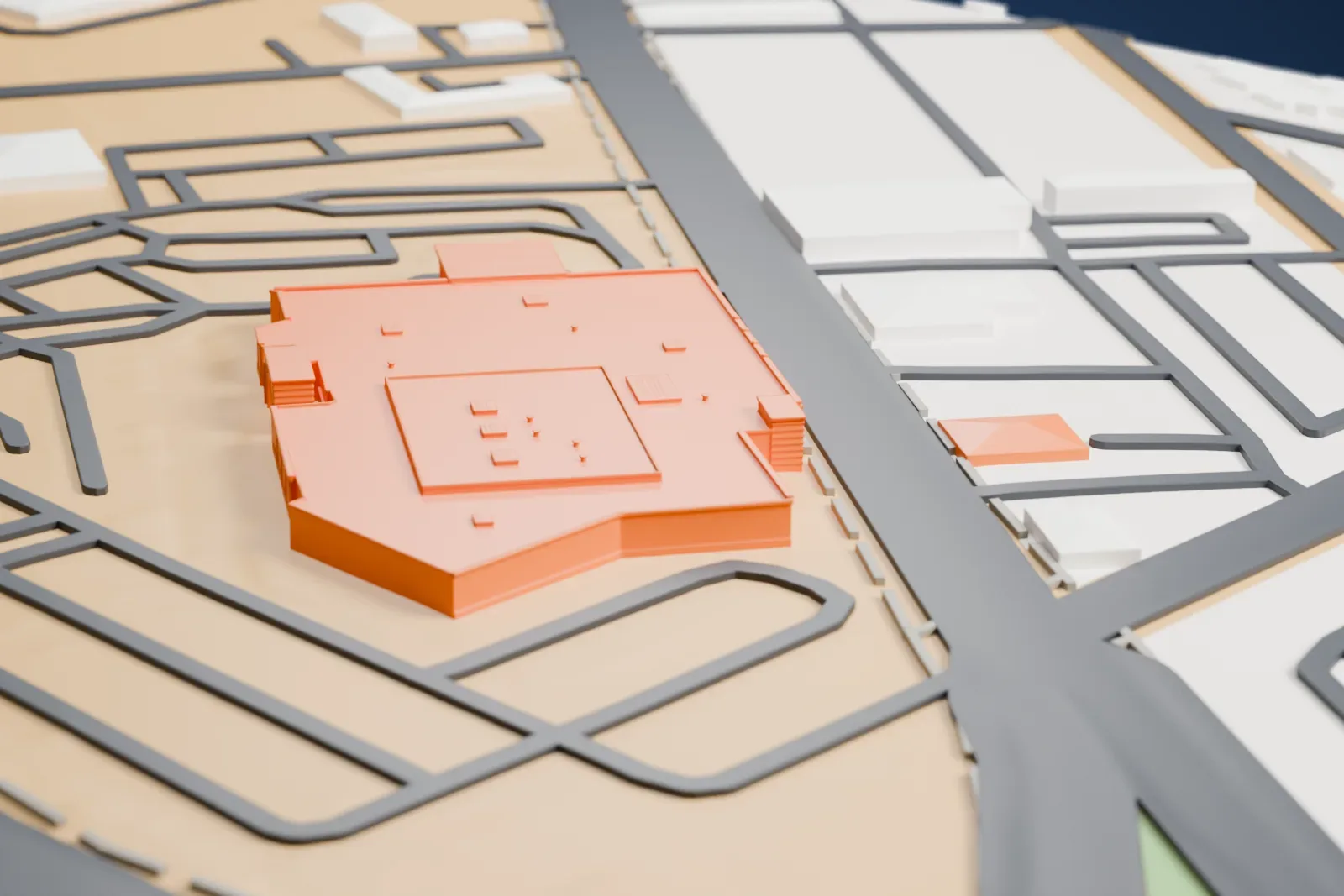 A white 3D print of Jerry's Nugget, a wide low casino building with a flat roof and arched entrances, surrounded by open ground, roads and houses.
