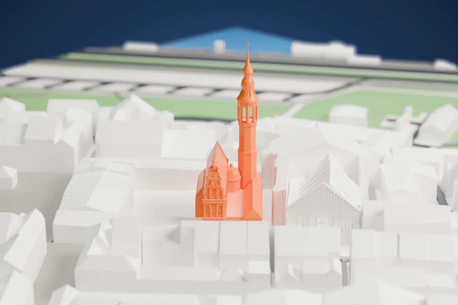 A white 3D print of the Jesuit Church with its ornate facade, surrounded by the streets and buildings of Warsaw's Old Town.