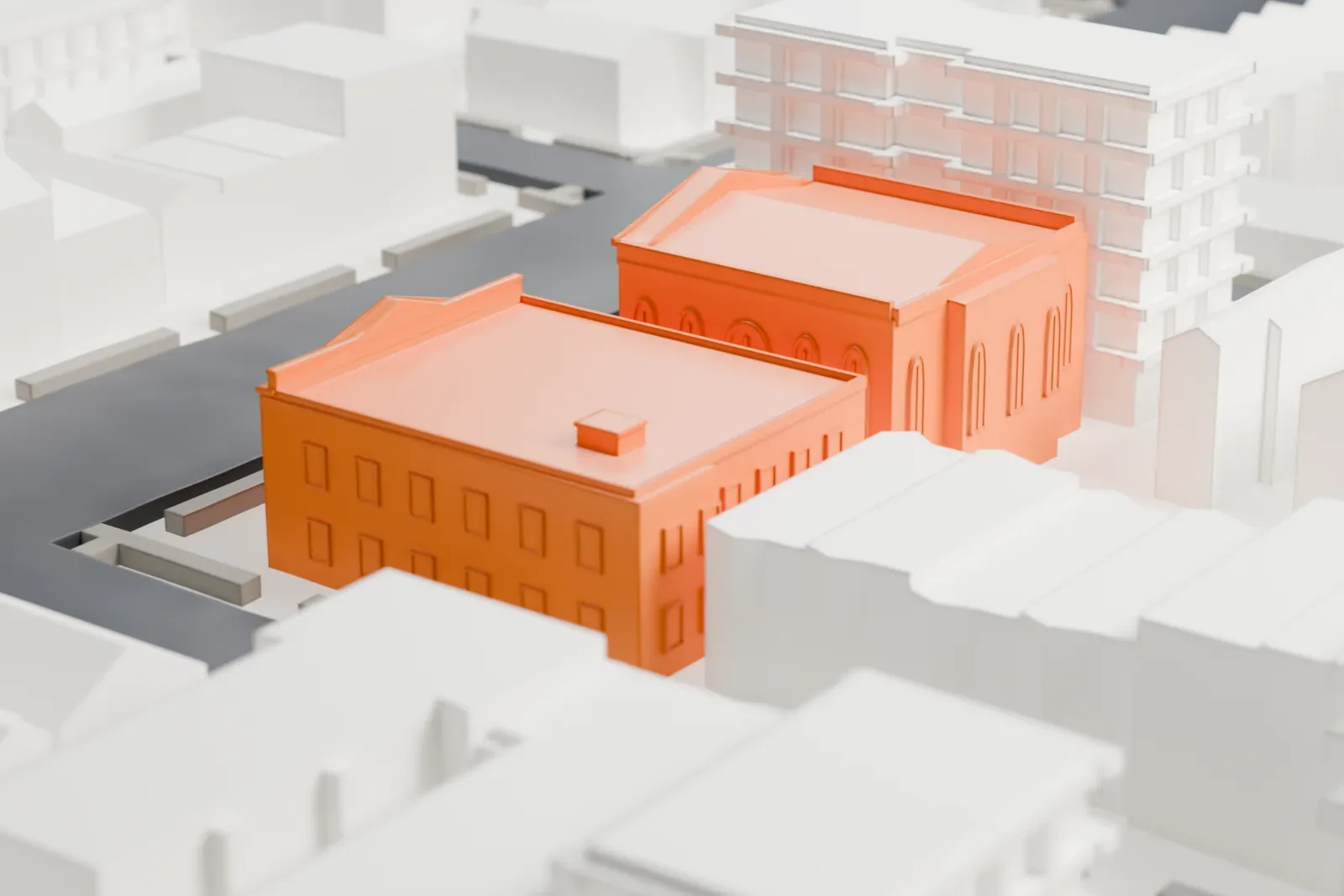 A white 3D print of the Jewish Center of Kings Highway, two low buildings, one with a columned, pedimented front, on a city block with streets and neighboring buildings.
