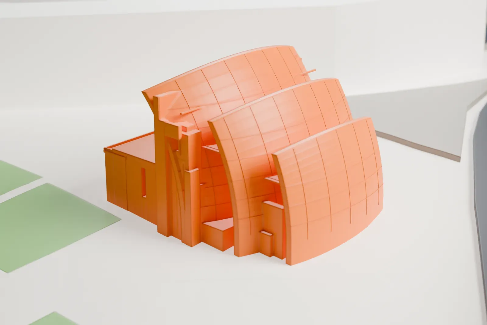 A white 3D print of the Jubilee Church, a Catholic church building, among the surrounding city streets and buildings.