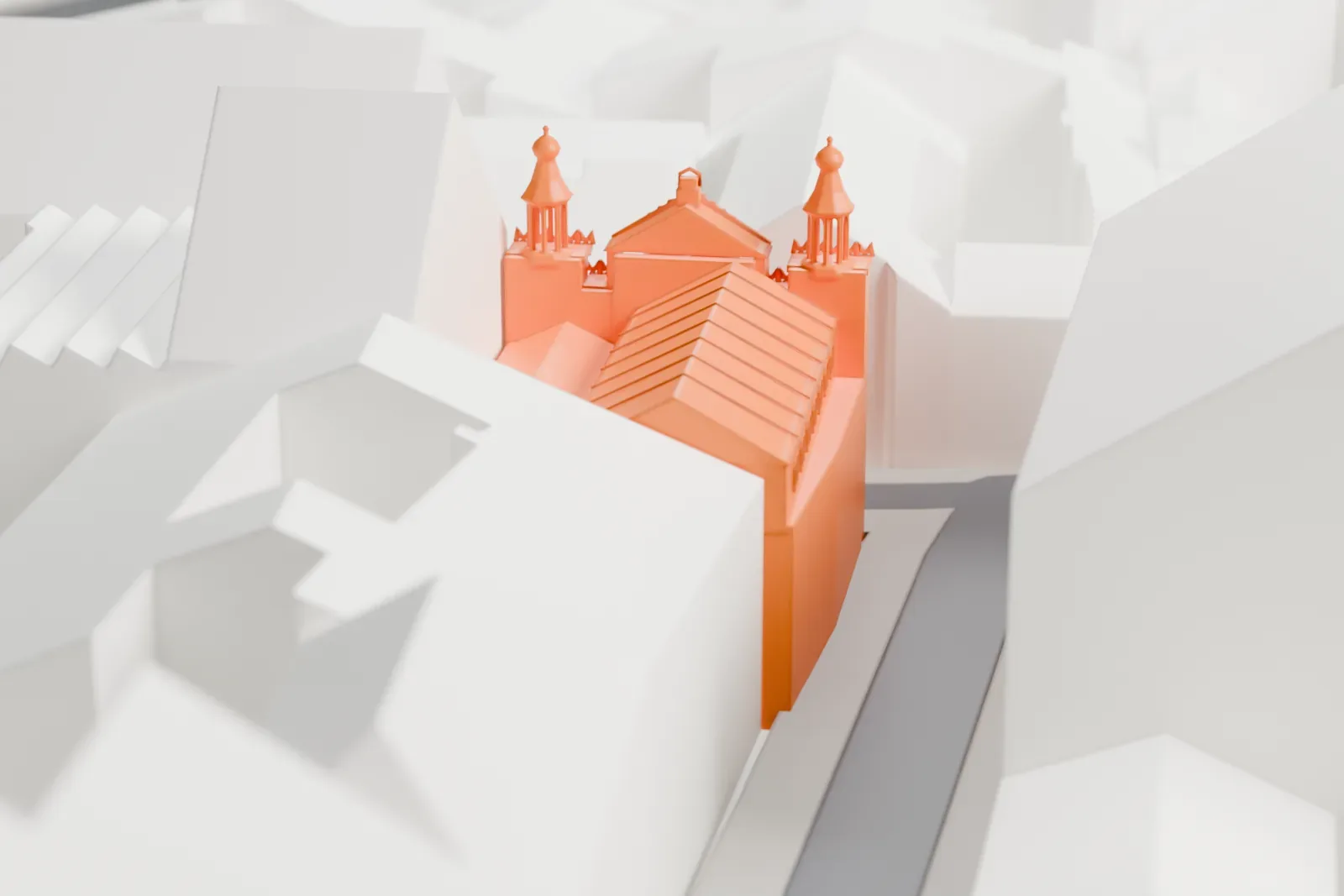 A white 3D print of the Jubilee Synagogue in Prague, with the surrounding streets and buildings around it.