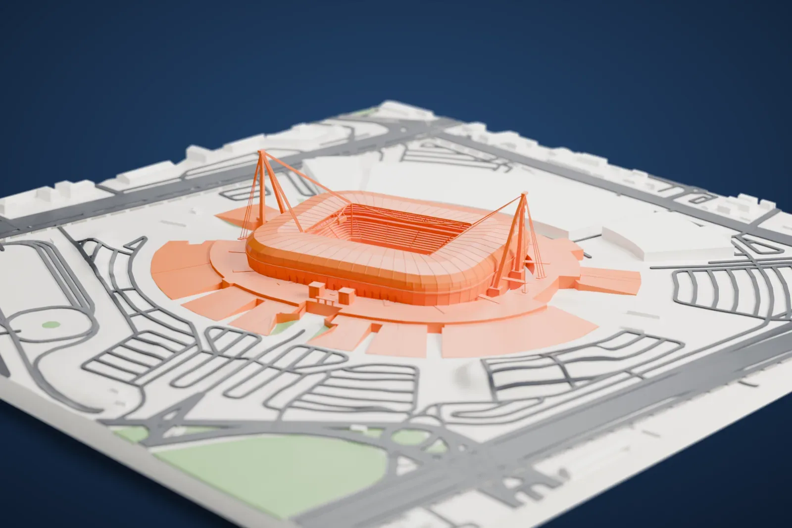 A white 3D print of Juventus Stadium, an oval football stadium with two tall slanted masts, standing on a round platform surrounded by roads and large low buildings.