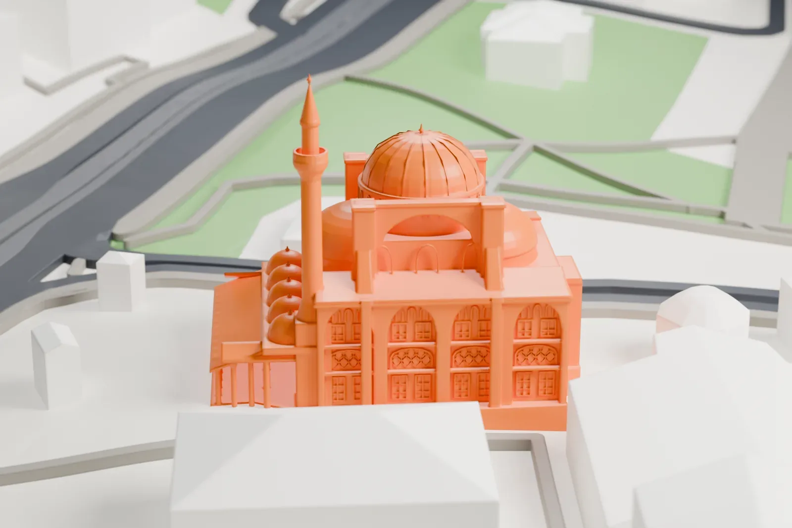 A white 3D print of the Kılıç Ali Pasha Complex, a domed mosque with its minaret among the surrounding streets and buildings.