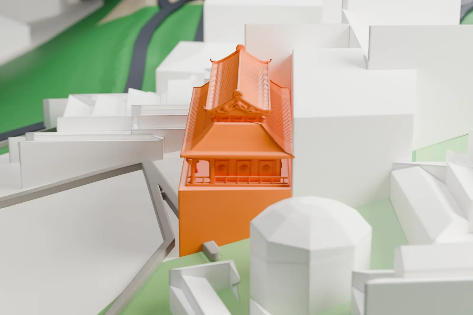 A white 3D print of Kek Lok Si temple complex with the surrounding streets and buildings around it.