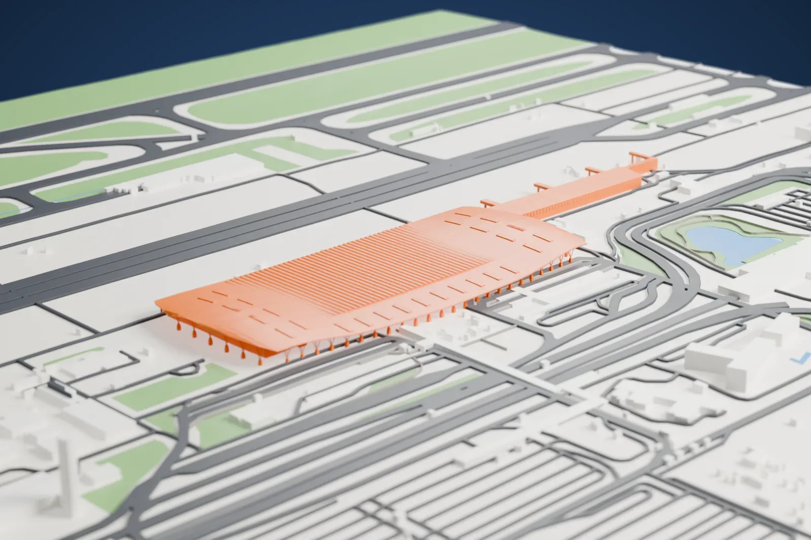 A white 3D print of Kempegowda International Airport Terminal 1, an airport terminal building, among the surrounding area.