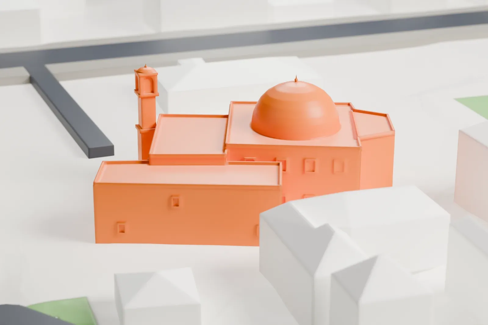 A white 3D print of the Khadija Mosque among the surrounding streets and buildings.