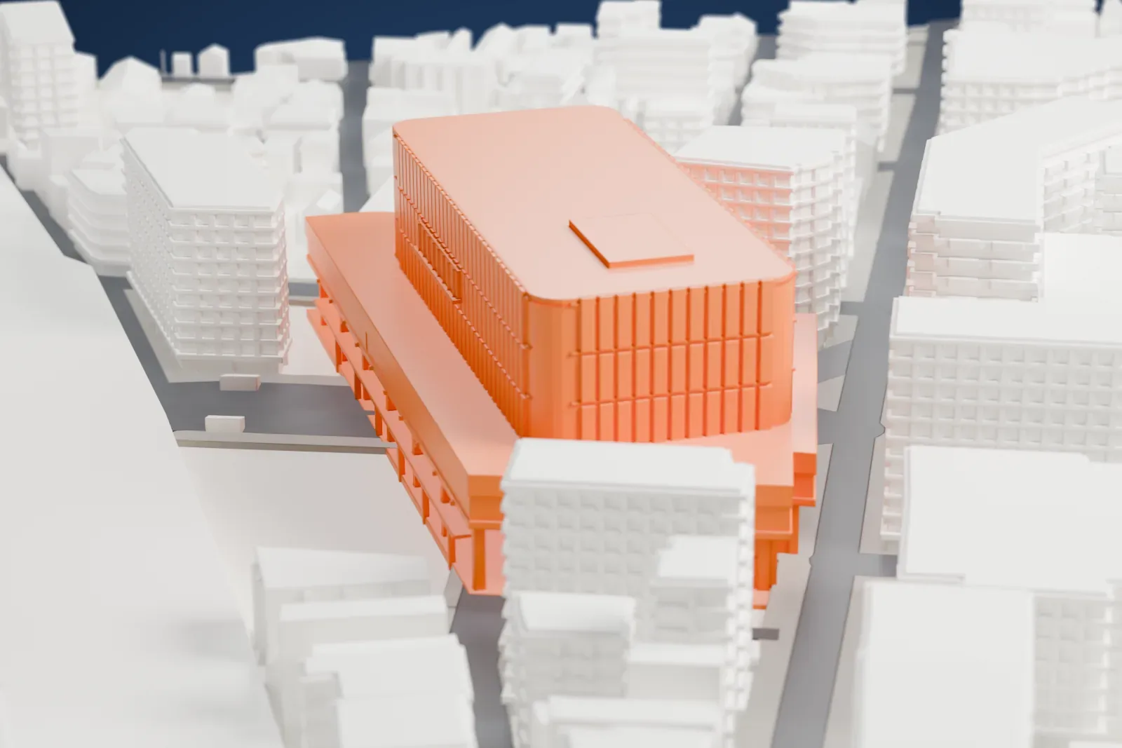 A white 3D print of Kichijōji Station, a railway station building, among surrounding streets and buildings.