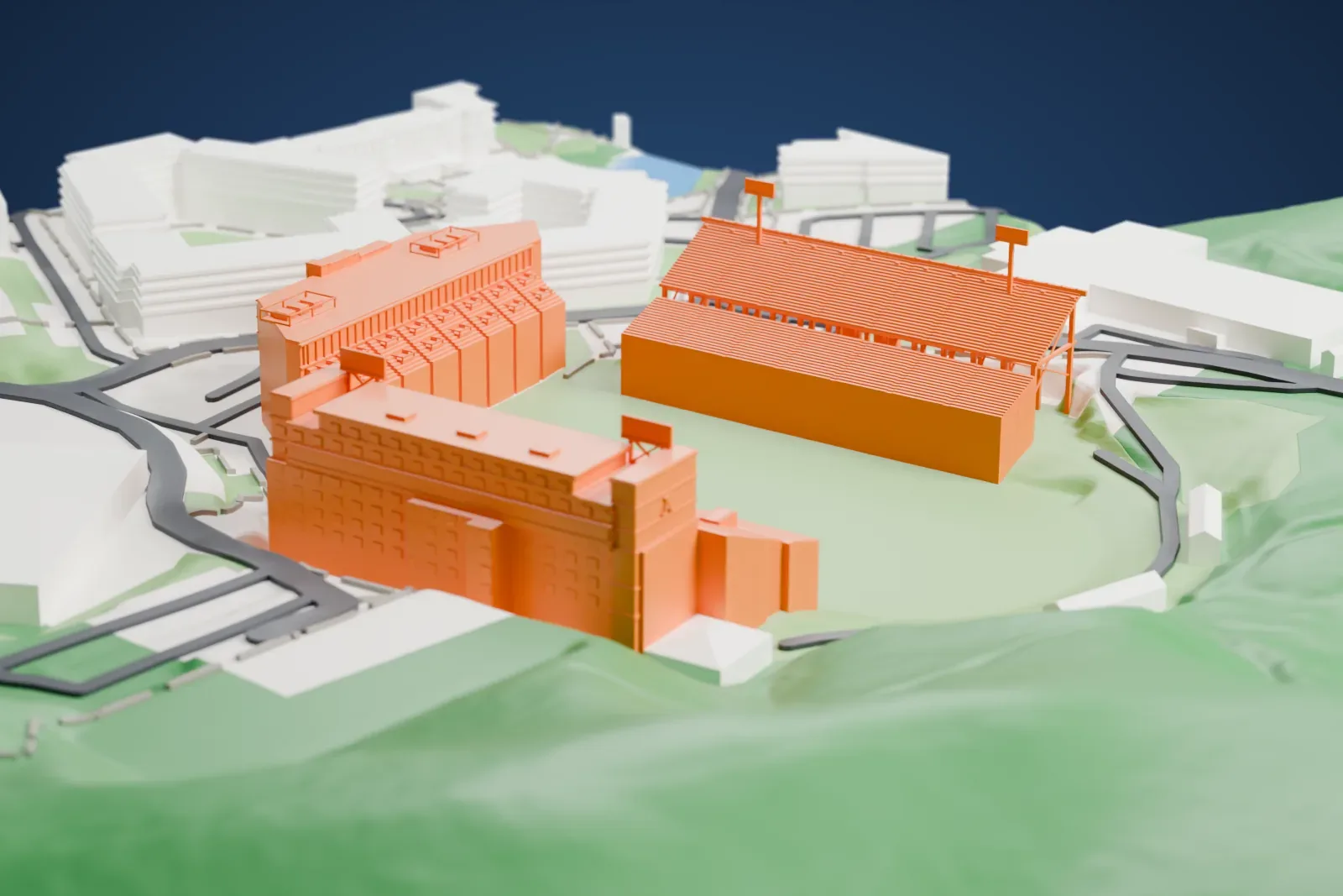 A white 3D print of the Kidd Brewer Stadium with stepped stands around an open field, nearby buildings, winding roads, and sloping terrain.