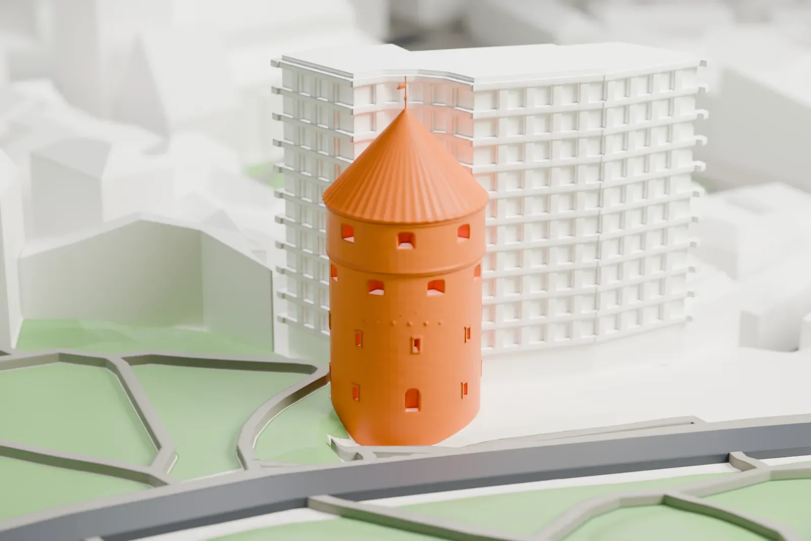 A white 3D print of Kiek in de Kök, a round tower with a conical roof, among surrounding streets and buildings.
