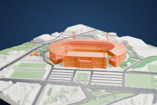 A white 3D print of King Baudouin Stadium, a horseshoe-shaped bowl with four slim floodlight masts, surrounded by roads, paved areas and green fields.