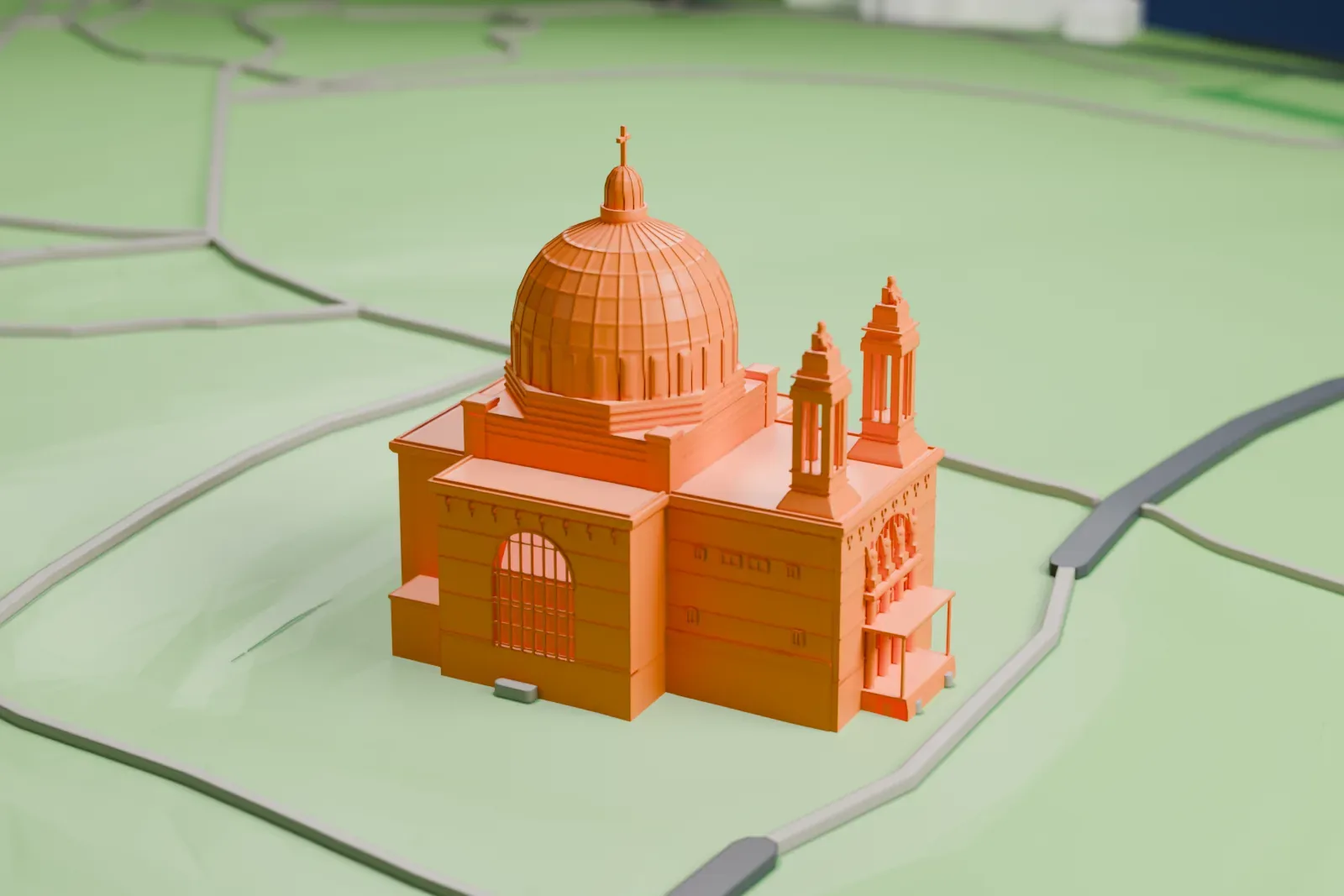A white 3D print of the Kirche am Steinhof on its hillside, with the church's dome and towers rising above the surrounding hospital buildings.