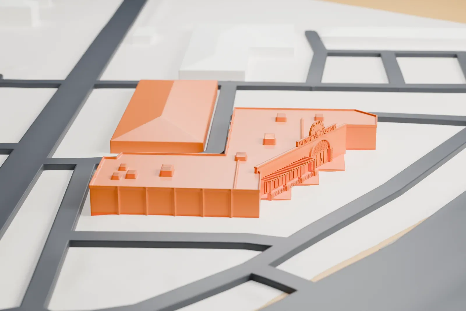 A white 3D print of the Klondike Sunset Casino, a low, bent building with a thin sign structure at the front and small boxes on its flat roof, set among roads and lots.