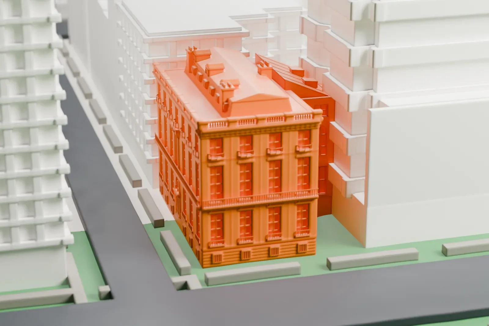 A white 3D print of the Knickerbocker Club among the surrounding buildings.