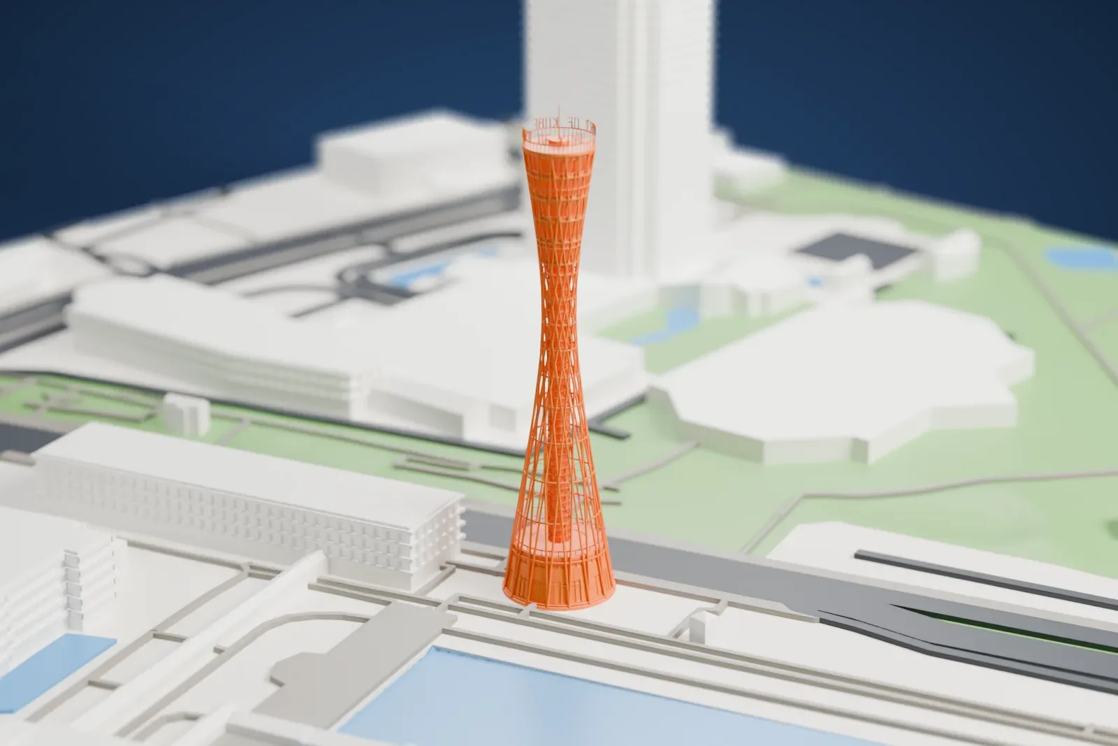A white 3D print of the Kobe Port Tower, an hourglass-shaped lattice tower standing among surrounding city buildings.
