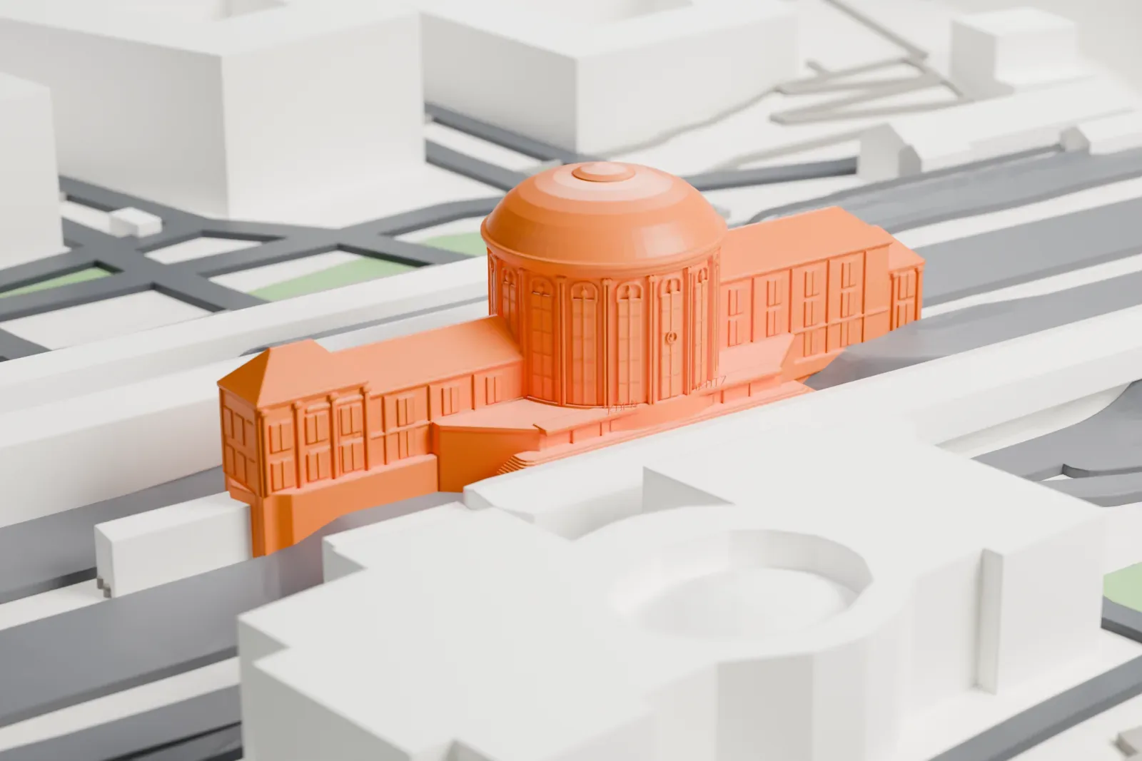 A white 3D print of the Köln Messe/Deutz station among surrounding streets and buildings.