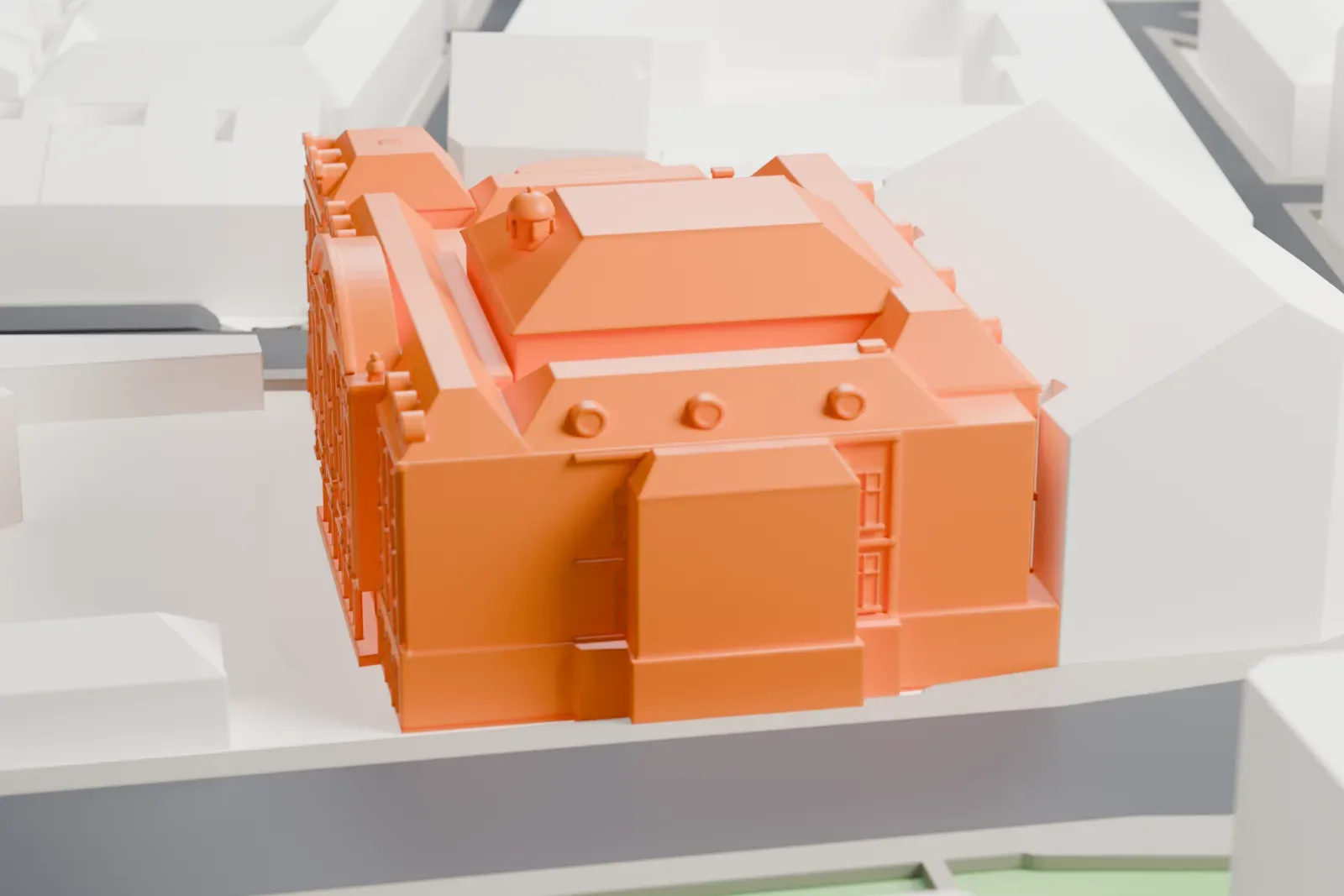 A white 3D print of the Konzerthaus in Vienna, standing among surrounding streets and buildings.