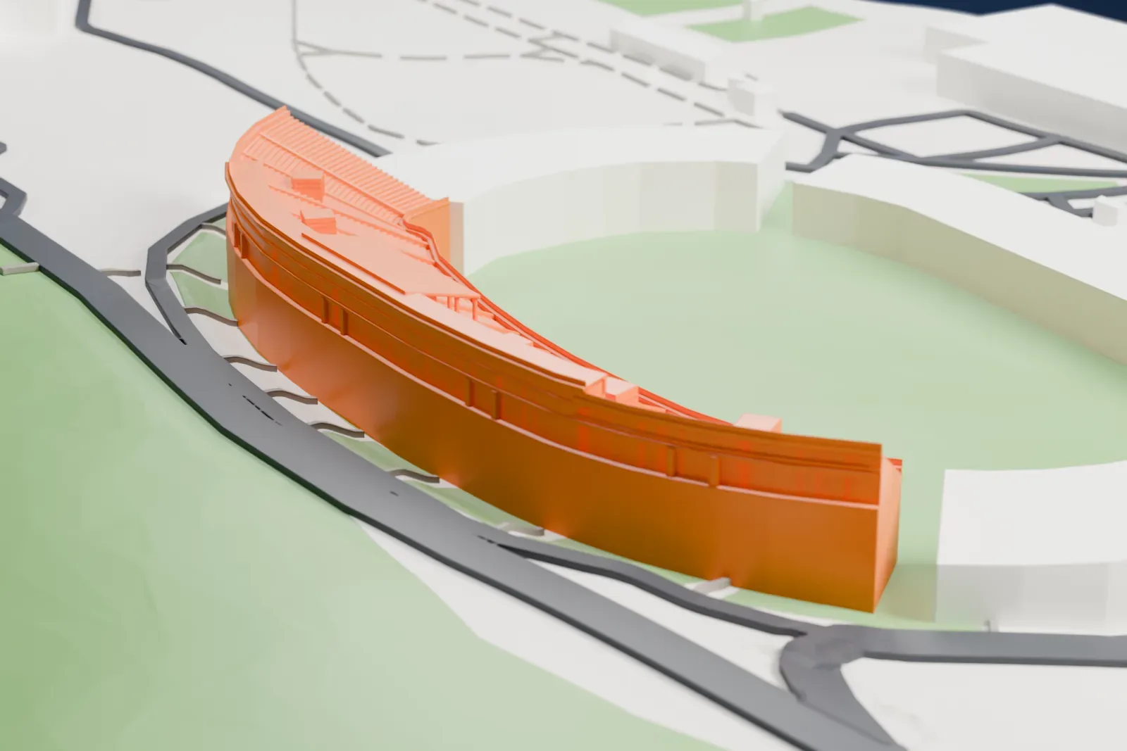 A white 3D print of Koševo City Stadium, a long curved open grandstand with a glazed gallery and a small roofed lodge along its top, set among surrounding streets and buildings.