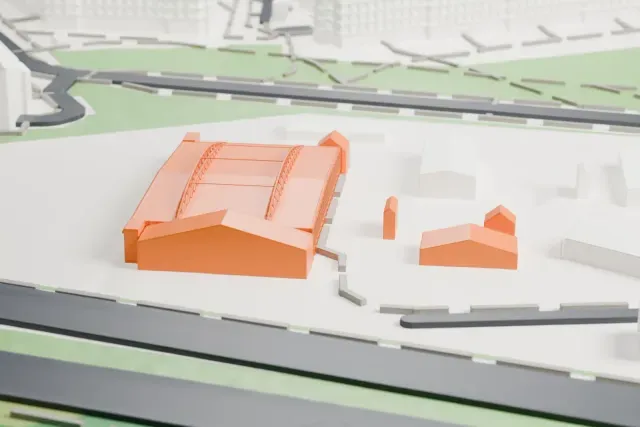 A white 3D print of the Krakow Czyzyny aircraft hangar model in Kraków, with the streets around it.